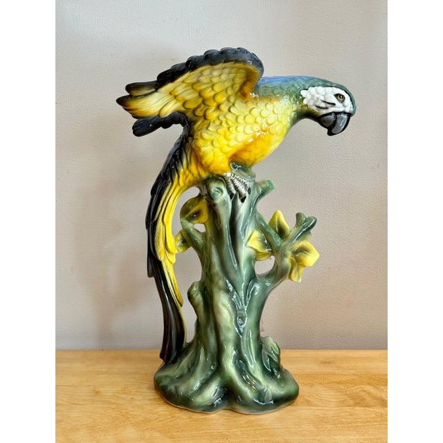 This ceramic macaw sculpture embodies the tradition of Italian decorative ceramics, likely produced in the mid-20th...
