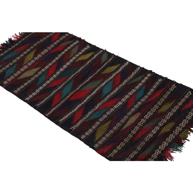 Handwoven in wool circa 1950-1960, this vintage 2x4 Afghan kilim and scatter rug is a new acquisition from Rug & Kilim’s...