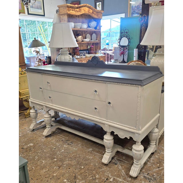 Vintage server painted in a creamy white with a gray top. I chose a color very similar to a Siberian grey cat. The piece...