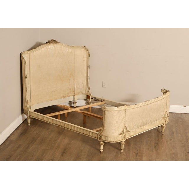 Elegant Antique French Louis XVI Style Full Size Bed Frame Featuring A Cream Painted Finish With Gilt Accents And Hand...