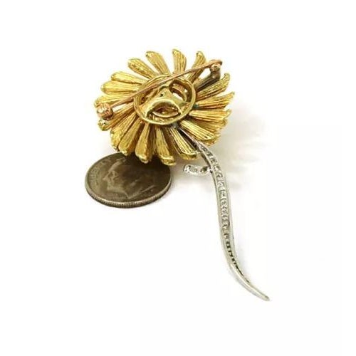 This is a gorgeous Estate flower brooch, it is well crafted from solid 18k yellow and white gold with a textured and...