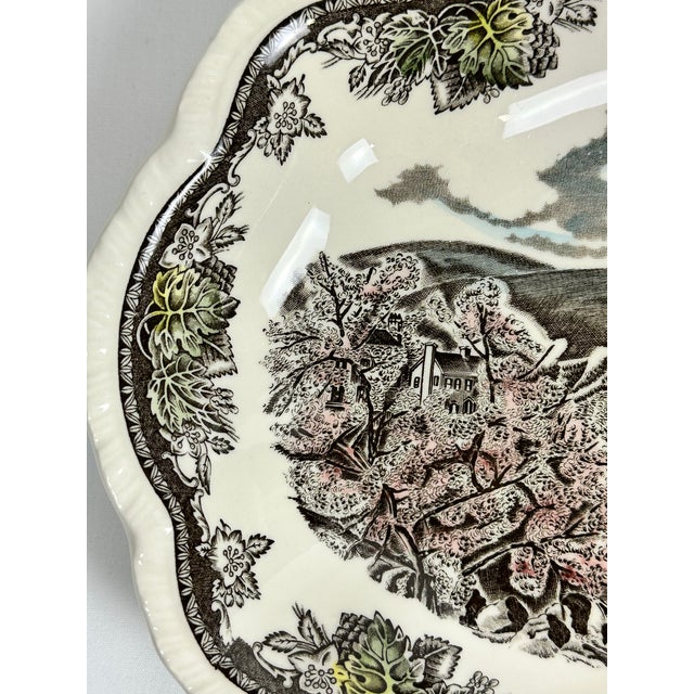 This Vintage Johnson Brothers Friendly Village Scalloped Bowl measures 1.75" H x 11" L x 9.25" W and is in excellent,...