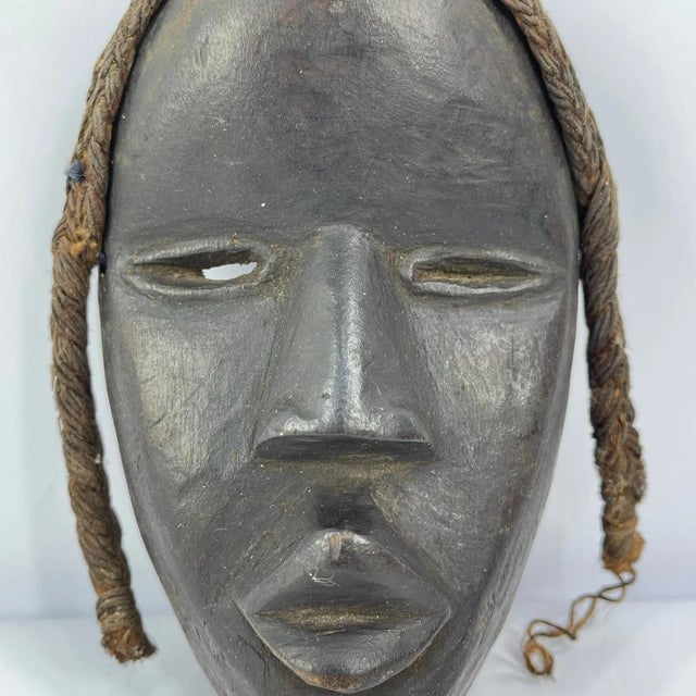 Embark on a journey of cultural exploration with our Dan Deangle Passport Mask. Handcrafted by skilled artisans from the...