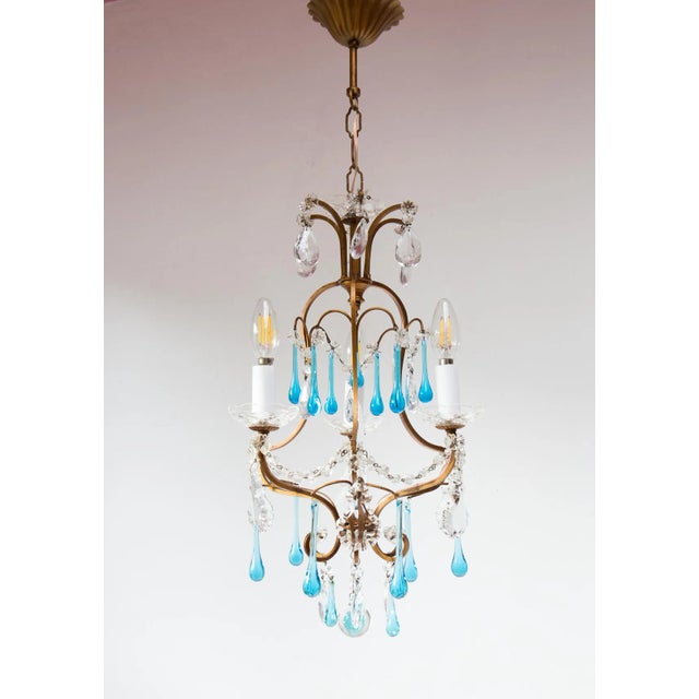 For 3 bulbs type E14. The shades are included. Up to 250V (Europe/UK Standard).The wiring of this item may be original and...