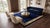 Exuding timeless sophistication, this 1920s antique Chinese Art Deco rug features a rich midnight blue field accented by...
