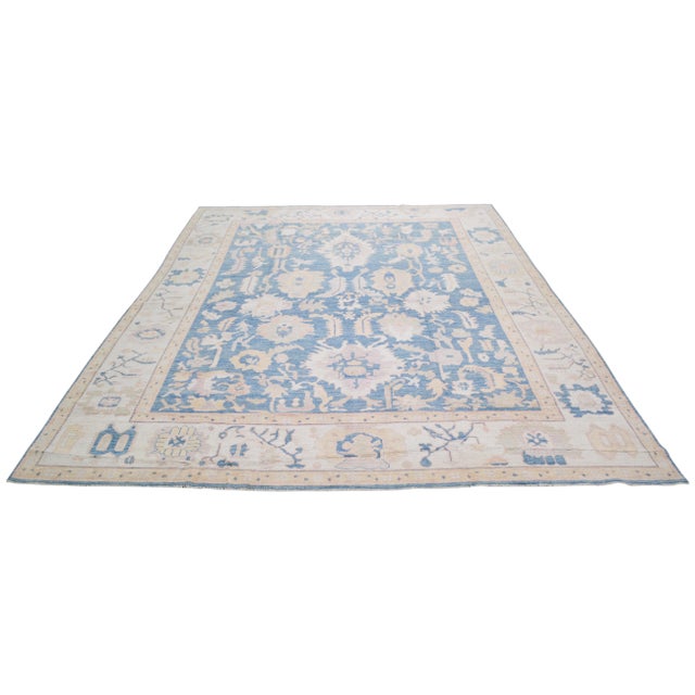 Pakistani hand woven Oushak rug with allover design and silky soft texture.