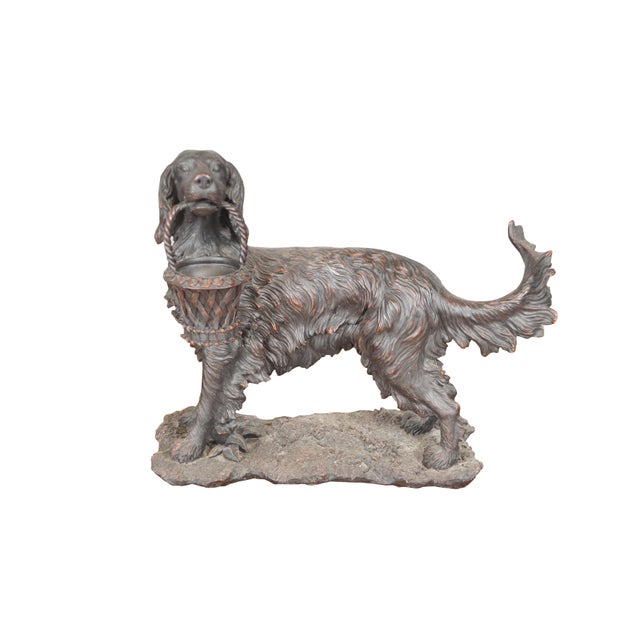 Vintage late 20th century faux bronze figurine / sculpture in the shape of an Irish / English Setter holding a decorative...