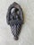 This striking antique door knocker is crafted in solid cast iron and features a bold American eagle perched above a shield...