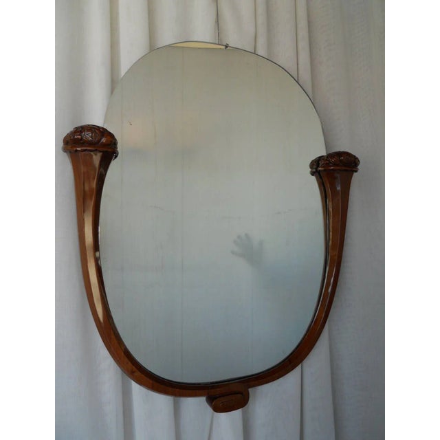 Gorgeous Louis Sue and Andre Mare attributed carved mahogany wall mirror. *THIS PIECE HAS NO IMPERFECTIONS (Due to...