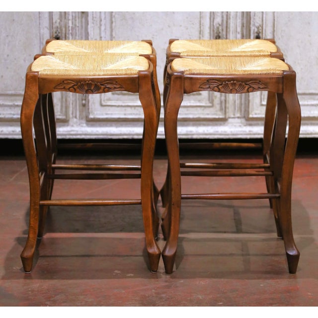 Add timeless French country charm to a kitchen island or breakfast counter with this elegant set of four Louis XV-style...