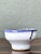This vintage handcrafted blue and white stoneware bowl captures the enduring beauty of mid-century studio pottery through...