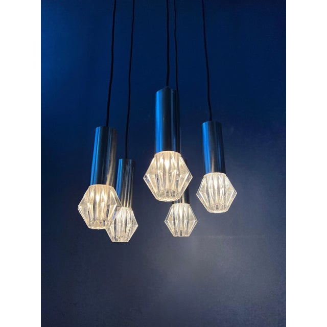 Mid century space age cascade pendant lamp / light fixture with 5 glass shades. The shades can easily be adjusted in...