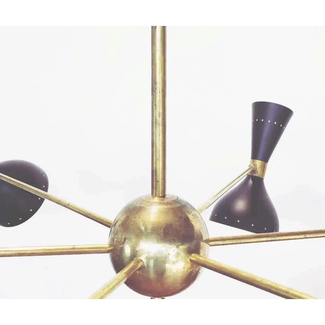 Large black and brass pendant lamp Materials: Brass, Metal Dimensions: 120 cm x 100 cm H Up to 250V (Europe/UK...