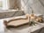 This elegant vintage tray in travertine stone stands out for its refined, naturally porous surface and distinctive...
