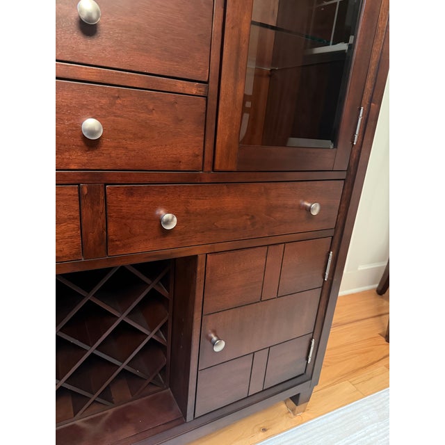 Never-used Broyhill Northern Lights lighted China hutch in a rich walnut finish ( 2013 Circa ) Features two glass door...