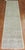 Neutral tone one of a kind Turkish runner with a borderless all over design, circa mid-20th century Measures: 2'7” x 11'9”.