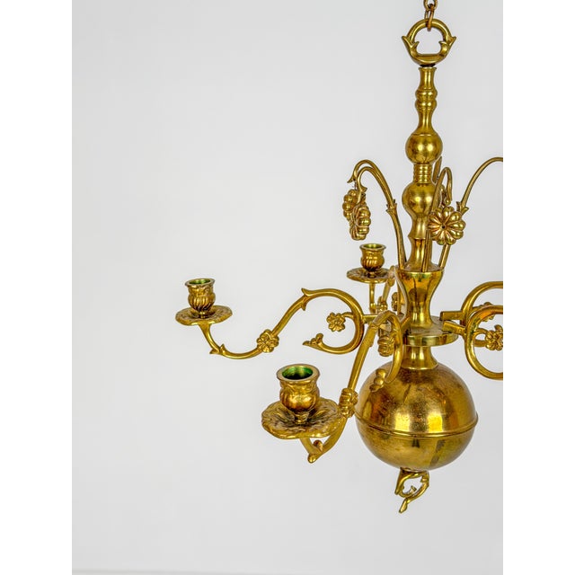 20th Century Swedish Brass Chandelier with Floral Motifs, 1920, in Very Good conditions. Designed 1920 to 1949 Up to 250V...