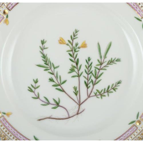 Royal Copenhagen Flora Danica plate in hand-painted porcelain with flowers and gold decoration. Model 20/3573 Date: 1968...
