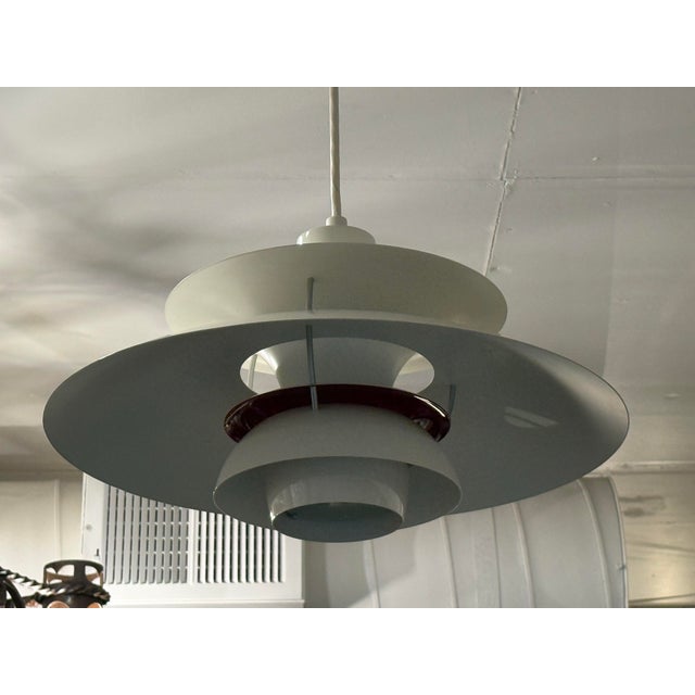 Design Plus Gallery presents the PH 5 Pendant by Poul Henningsen for Louis Poulsen. Designed in 1958, the PH 5 is one of...