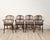 A set of six antique English oak Windsor armchairs, 19th century. Seat height 20" with cushion, 17.25" without.