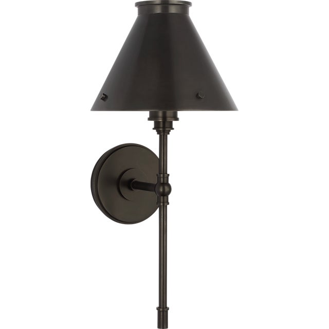 Description: Embodying industrial minimalism with a touch of elegance, the Chapman & Myers Parkington collection merges...