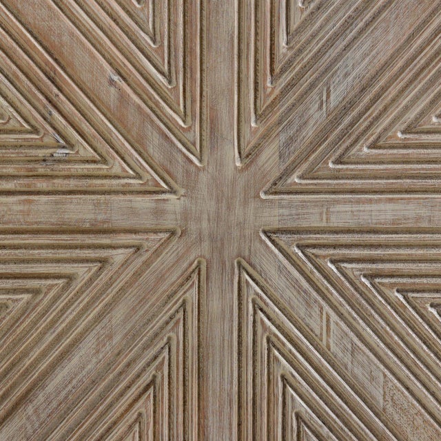 Warm white wash finish mango wood sideboard with geometric hand carved surface on four doors. Set on modern black iron...