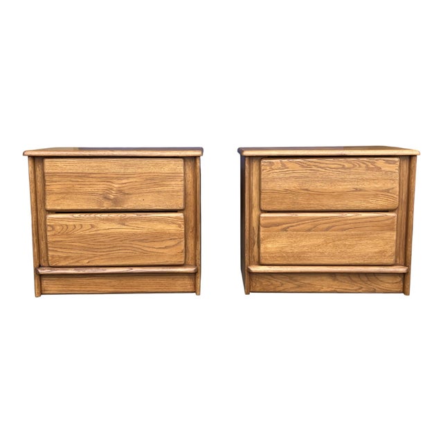 This exceptional pair of restored solid oak nightstands beautifully blends timeless craftsmanship with clean, understated...