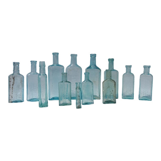 Set of 13 Late 19th Century Embossed Druggist/Pharmacy Bottles For Sale