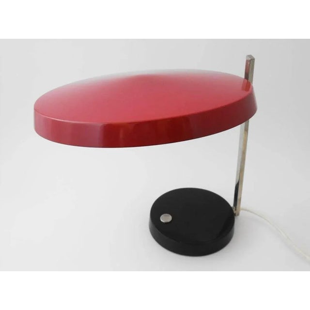 Oslo desk lamp by Heinz Pfaender from Hillebrand. From 1962. In red, black and chrome. You can swivel and focus the hood...