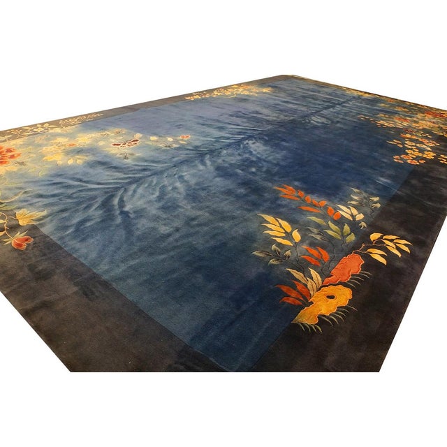 Antique Oversized Art Deco Chinese Floral Knotted Rug, Circa Date: 1935. This exceptional example of an Art Deco Chinese...