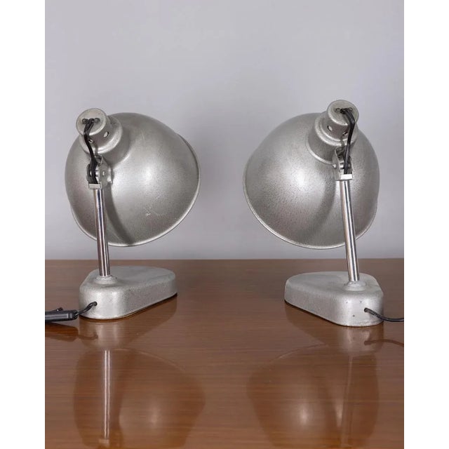 Pair of adjustable metal lamps, designed by Seminara Torino, 1960s. This piece has an attribution mark, I am sure that it...