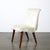 This Art Deco button-back chair by Russel Wright for the Conant Ball Company was crafted circa 1940, beautifully captures...