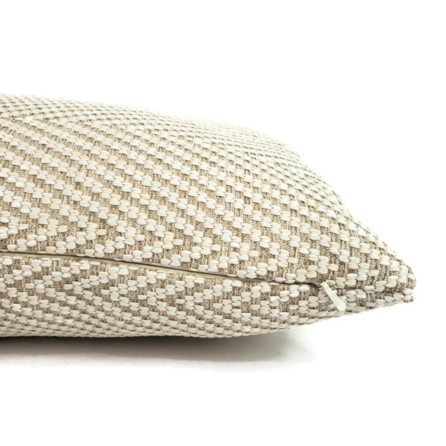 From Kravet is Bow Herringbone in the color Sand pillow cover. This fabric is made from 100% polyolefin which is water...