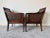 A charming pair of 1970’s Regency-style caned armchairs by Hickory Chair, beautifully crafted with faux bamboo carved...