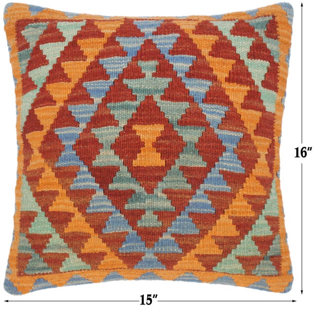 Rows of rust, orange and blue stepped diamonds repeat across a warm orange ground. The pattern runs edge to edge, so it...