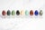 This attractive collection of nine polished stone specimen eggs is a wonderful display of nature's artistry, showcasing an...
