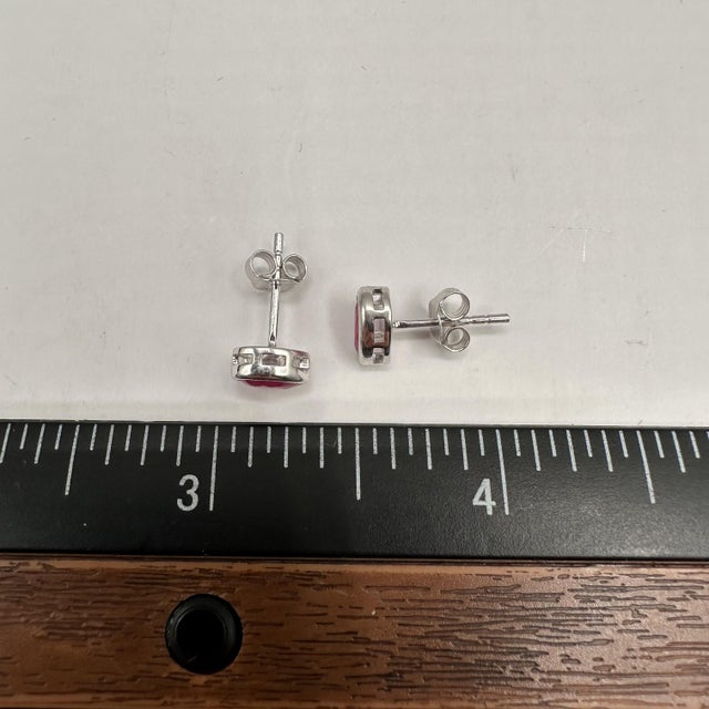 Early 21st Century Bezel Set Ruby Studs in 14kt White Gold – 6x4mm Pear-Shaped Rubies, Push Backs, A Pair For Sale - Image 5 of 5
