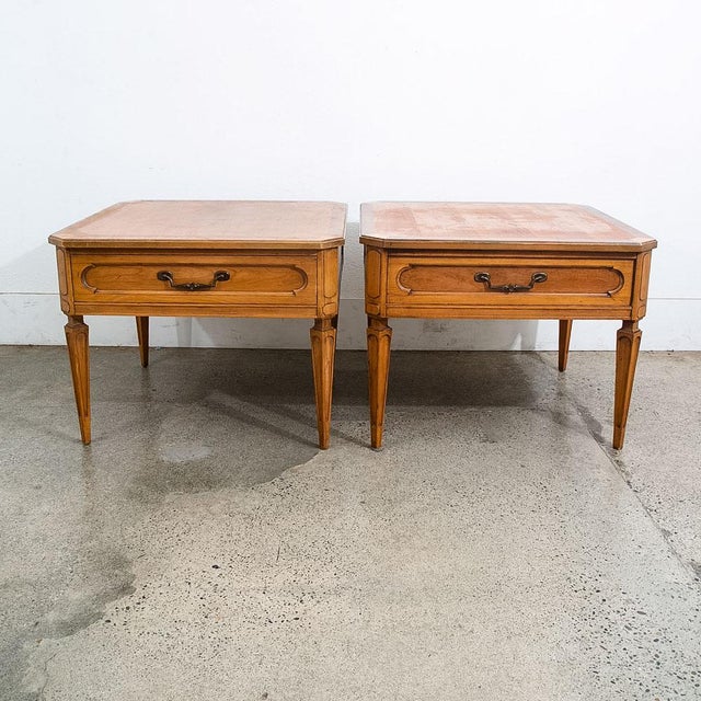 High quality American made nightstands with single drawer. Each piece offers burl edge top surface as well as tapered...