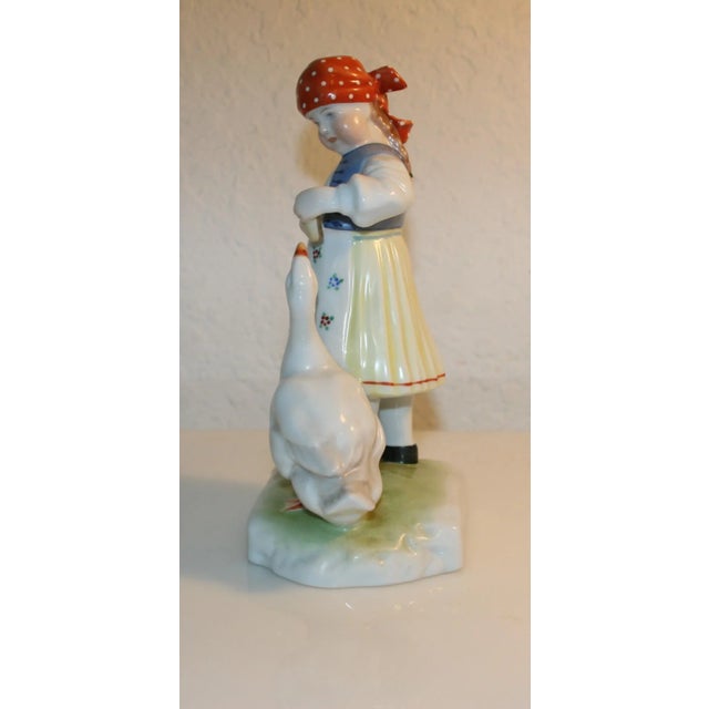 Vintage Herend Hand Painted Porcelain Figurine 5565 Young Girl Feeding Goose This charming Herend figurine was produced in...