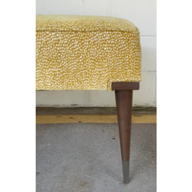 Original Retail $6000, stylish Caracole Couture Abstract Modern Mustard Pebble Bench, warm walnut finished wood legs...