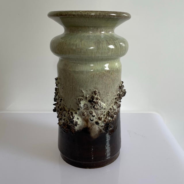 A vintage 1960’s Gilt Pottery lava vase from Iceland. The vase features a distinctive textured glaze made with real lava...