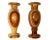 Each vase is intricately carved from a different block of onyx, displaying varying shades of green and reddish veins. In...