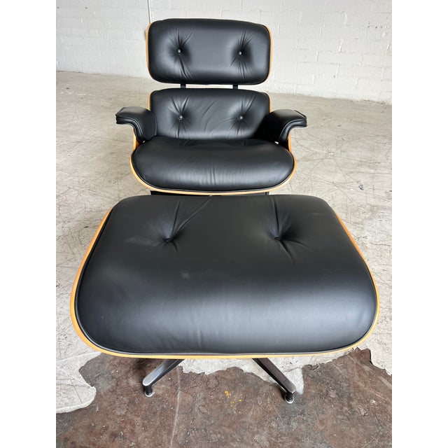 2000 - 2009 Herman Miller Eames Chair and Ottoman, Black Leather and Cherry, 50th Anniversary Edition For Sale - Image 5 of 6