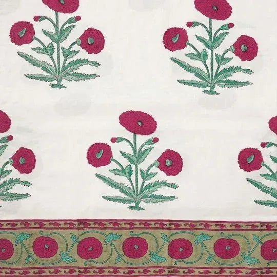 The Poppy design in magenta pink on cream is inspired by Mughal textile fragments from the late 17th century on display at...