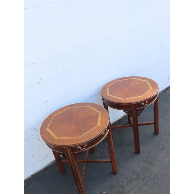 These beautiful End Side Tables are made out of wood, mahogany veneer, and metal. The Tables were made by Lane Furniture...