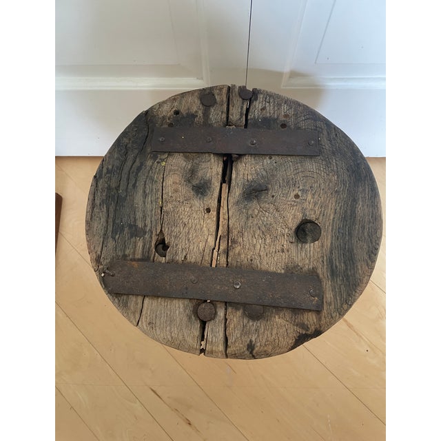 The Antique 3 Legged Milking Butcher Stool is a unique piece with reinforced primitive iron straps, adding a touch of...