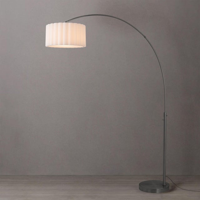 The Scallop Arc Lamp is a modern lighting masterpiece designed by Peter Morelli in 1960. This elegant arc lamp features a...