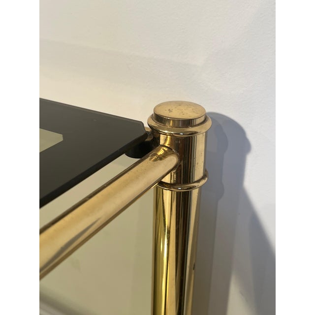 Metal 1970s Pair of brass side tables with smoked glass shelves For Sale - Image 7 of 10