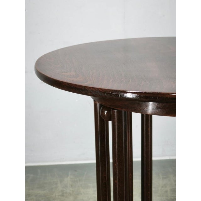 A rare and sculptural Fledermaus table attributed to Jacob & Josef Kohn or Thonet, dating from circa 1900. An excellent...