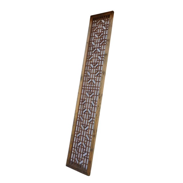 This is a long wooden panel with distressed wood pattern finish. Center is oriental geometric pattern. Joint parts may...